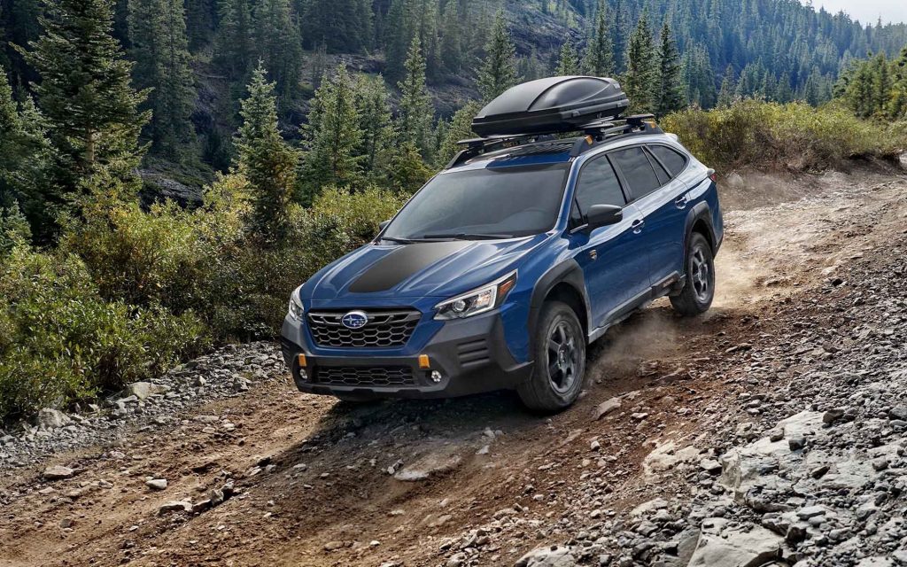 2022 Subaru Outback Wilderness Edition driving down a dirt trail