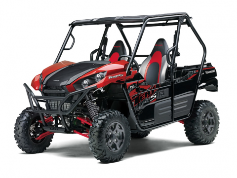 a red and black 2021 Kawasaki Teryx model in a press photo against a white backdrop 