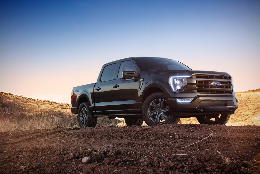 A black 2021 Ford F-150 parked at dusk, the F-150 is one of the best new pickup trucks under $40,000