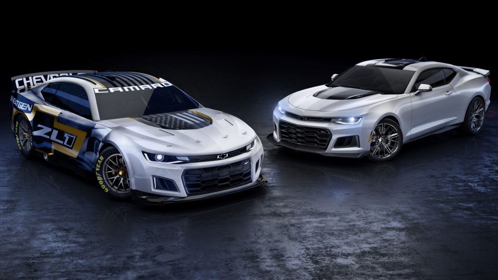 The silver-black-and-gold NASCAR Next Gen Chevrolet Camaro ZL1 next to a silver road-going 2021 Chevrolet Camaro ZL1