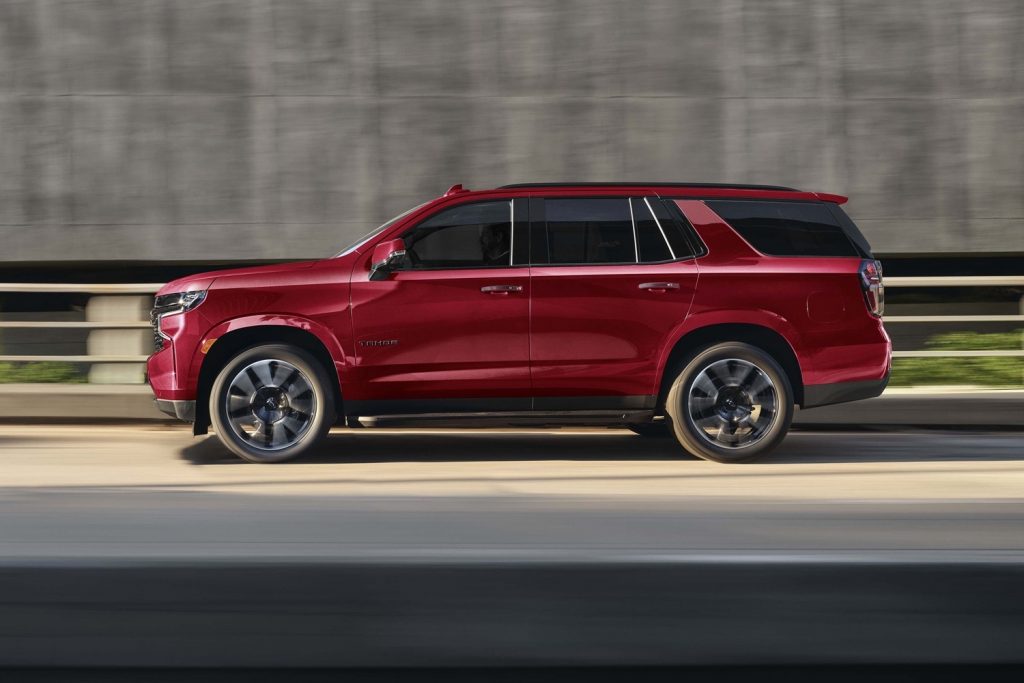 The 2021 Chevrolet Tahoe driving down the road