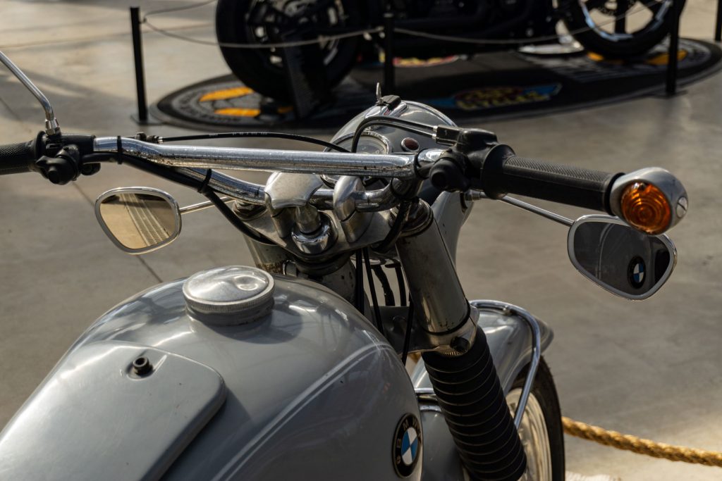 The rear view of a gray 1969 BMW R69 S's handlebars